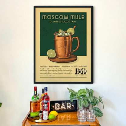 a framed poster of a Moscow Mule cocktail hanging on a wall above a wooden bar counter with various liquor bottles and glasses.