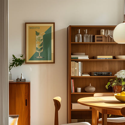 a cozy and well-organized living space with a wooden bookshelf, a framed poster of a mojito, and a wooden cabinet. The room has a warm and inviting atmosphere, with natural light streaming in from the window.