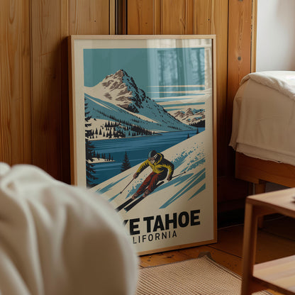 A framed poster of a skier in a yellow jacket and red pants, depicting a snowy mountain landscape with a lake in the background, is displayed in a room with wooden walls.