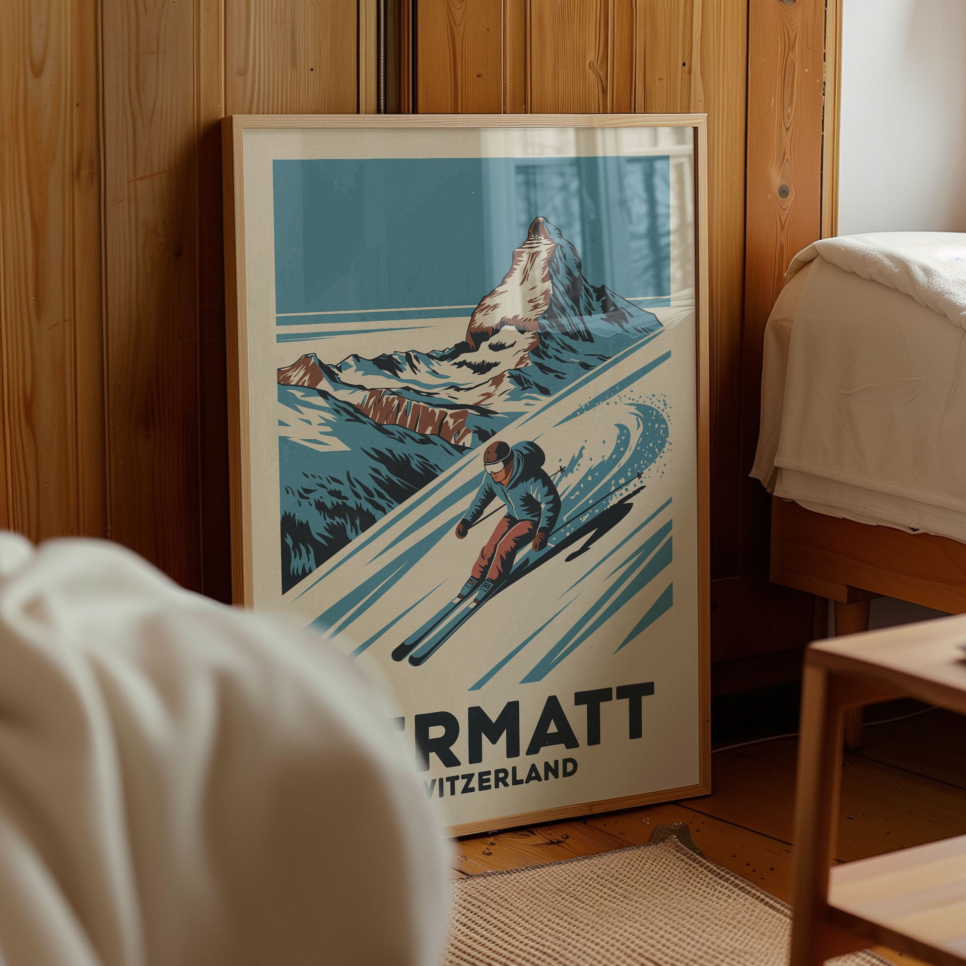 A framed poster of a skier on a snowy mountain, with the text "MORETTI SWITZERLAND" below the illustration.