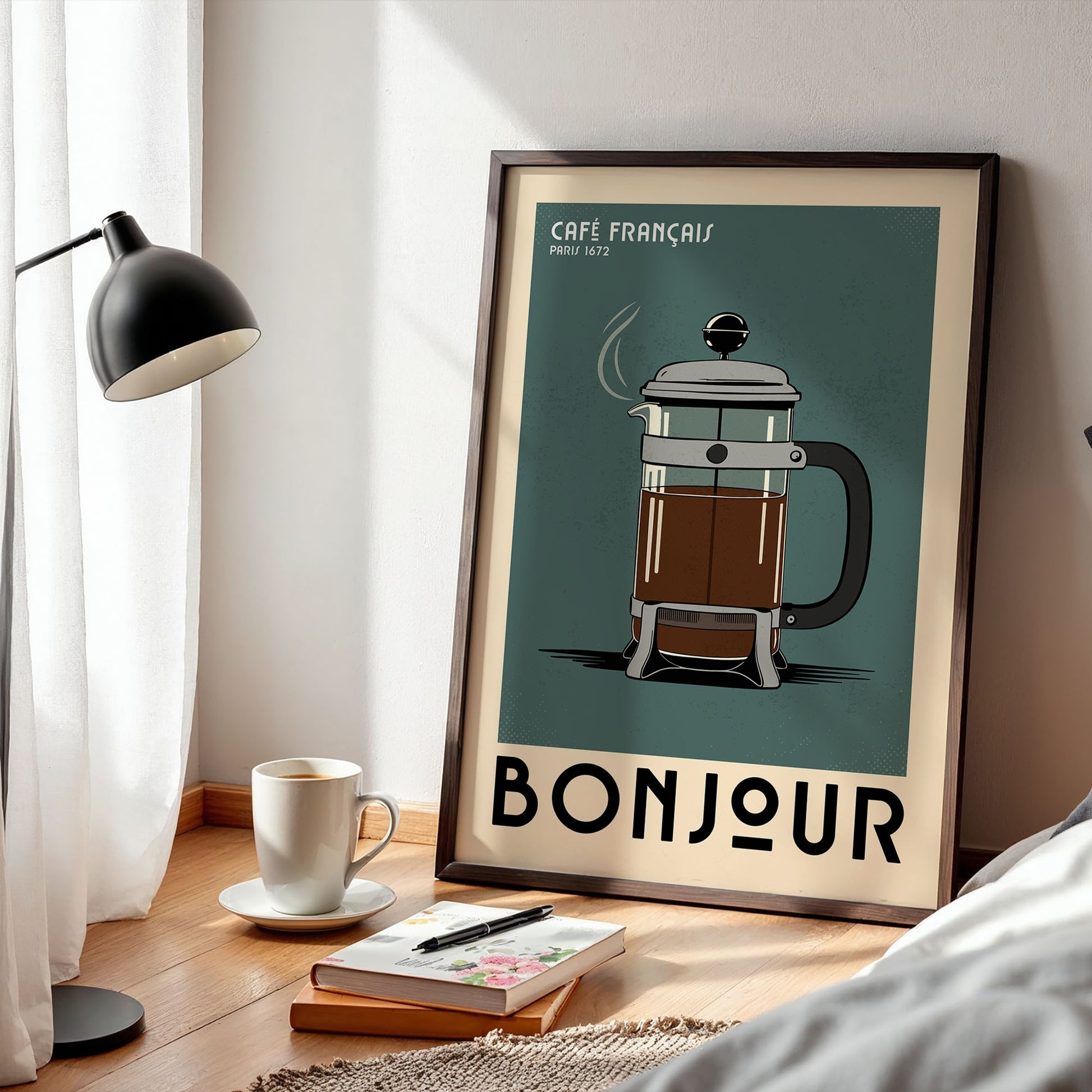a framed poster of a French press coffee maker, with a cozy and inviting atmosphere surrounding it.