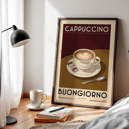 a framed poster of a cup of cappuccino, with a lamp, a book, and a cup of coffee on a wooden table in the foreground.