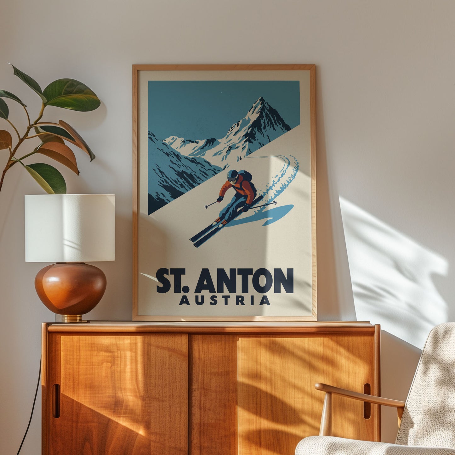 a framed poster of a skier on a mountain, with the text "St. Anton, Austria" below the illustration.