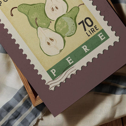 A postage stamp featuring a close-up of pears, with the word &quot;PERE&quot; prominently displayed.