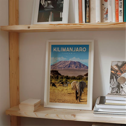 A framed poster of Kilimanjaro, the highest peak in Africa, is displayed on a shelf among other items.