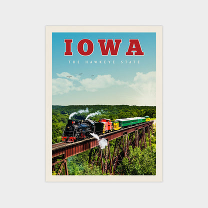 A vintage-style poster depicting a steam locomotive crossing a bridge over a lush green landscape, with the text "IOWA THE HAWKEYE STATE" prominently displayed.