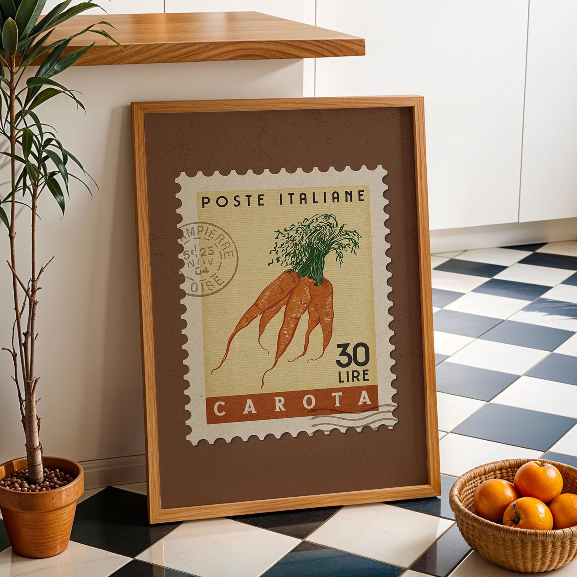 a potted plant sitting next to a picture of a carrot
