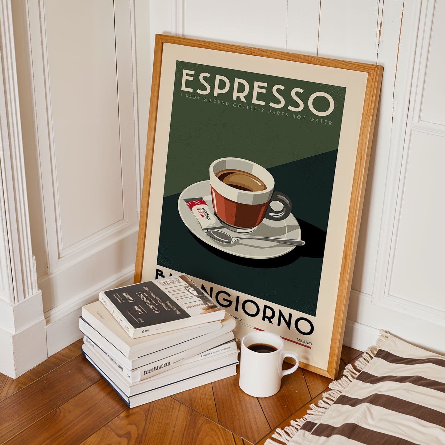 A framed poster of espresso coffee on a table, with a stack of books and a mug of coffee nearby.