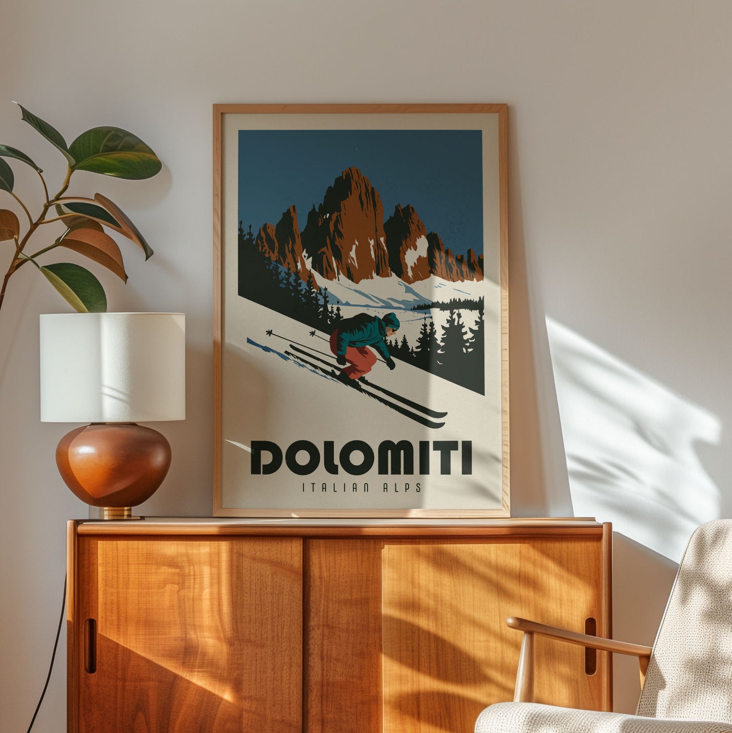 a framed poster of a skier on a mountain, with the text "DOLOMITI ITALIAN ALPS" below the illustration.
