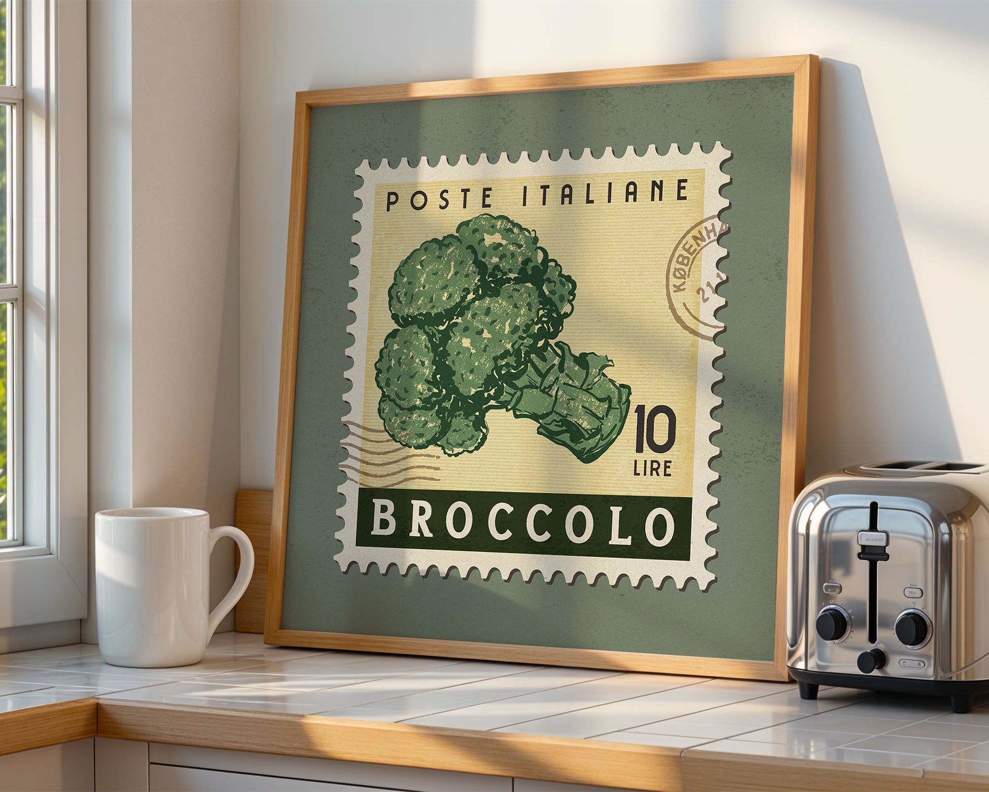 a picture of a broccoli on a counter next to a toaster