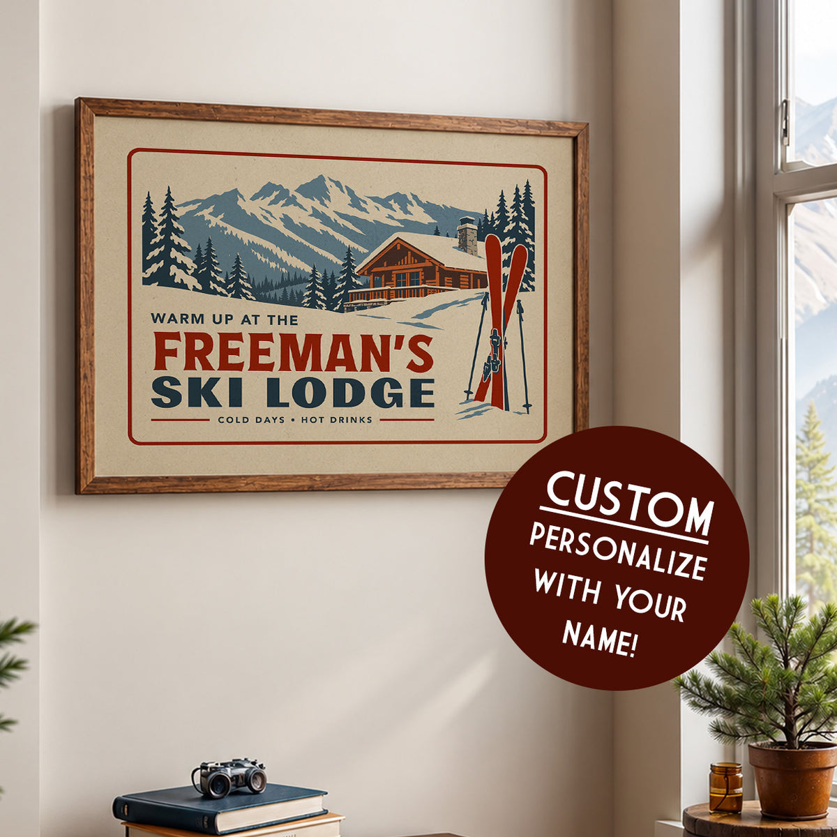 a framed poster of a ski lodge with mountains in the background, along with a sign that says "Warm up at the FREEMAN'S SKI LODGE".