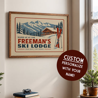 a framed poster of a ski lodge with mountains in the background, along with a sign that says "Warm up at the FREEMAN'S SKI LODGE".