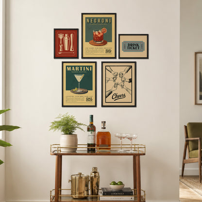 a wall display with framed vintage-style posters and a wooden bar cart with various drinkware and decorative items.